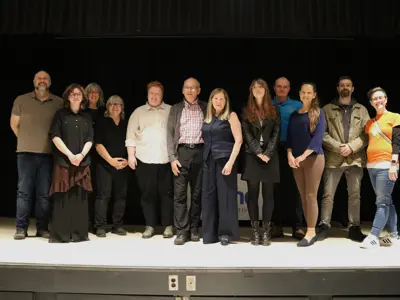 Award winners standing on stage
