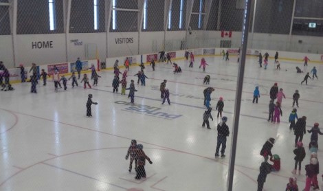 People skating on ice at the Rec Centre arena