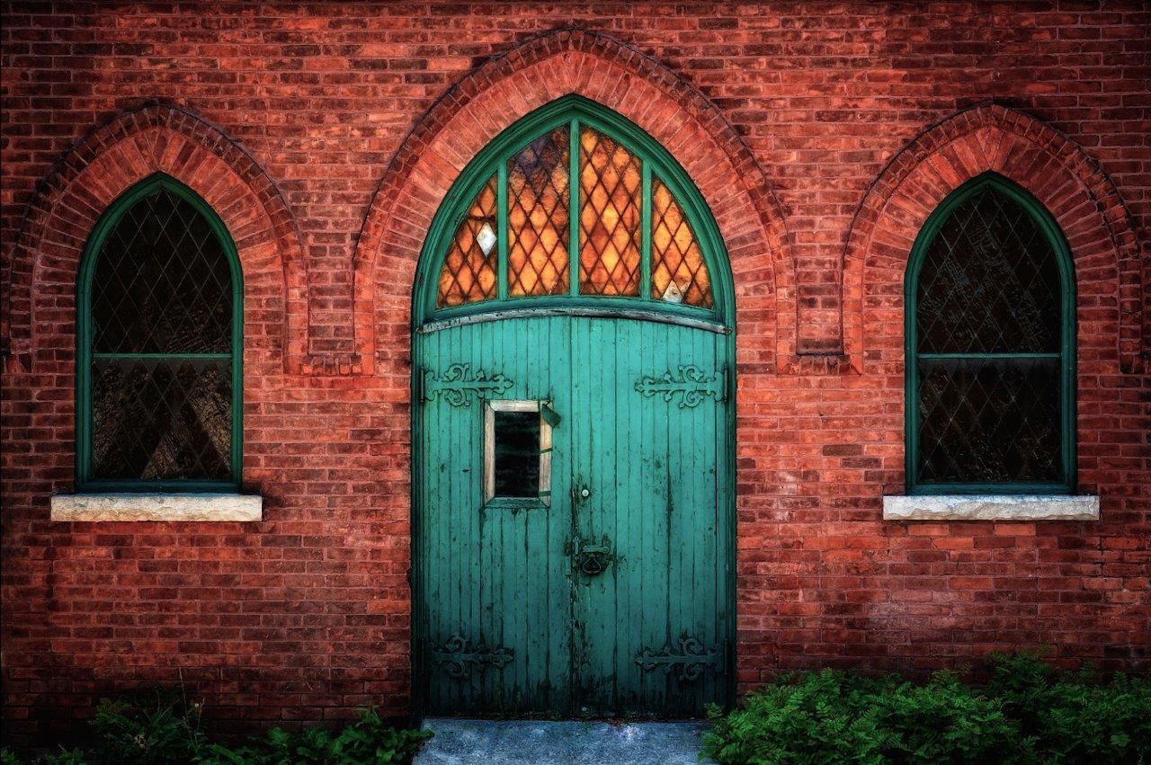 Blue door on brick building